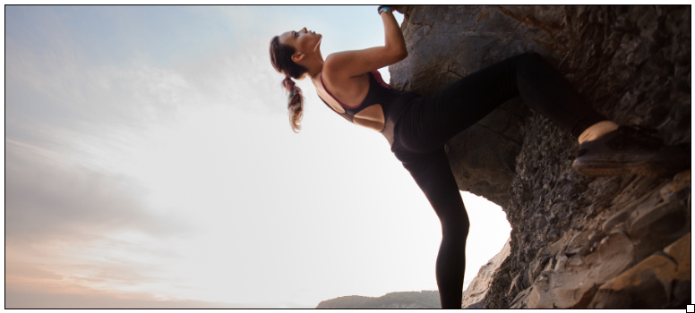 woman rock climbing